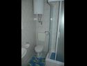 Apartmani Iva - sea view A1(2+1), A2(4+1) Postira - Otok Brač   - Apartman - A1(2+1): kupaonica s toaletom