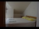 Apartmani Jozo - 150 m from pebble beach: A1(2), A2(2), A3(2), A4(4), A5(4) Gradac - Rivijera Makarska   - Apartman - A5(4): spavaća soba