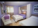 Apartmani Palmina - comfort apartment: A1 veliki (6),  A2 žuti (4+1), A3 lila (2), SA4 bijeli (2) Makarska - Rivijera Makarska   - Apartman - A1 veliki (6): spavaća soba