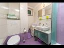 Apartmani Palmina - comfort apartment: A1 veliki (6),  A2 žuti (4+1), A3 lila (2), SA4 bijeli (2) Makarska - Rivijera Makarska   - Apartman -  A2 žuti (4+1): kupaonica s toaletom