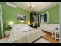 Apartmani Palmina - comfort apartment: A1 veliki (6),  A2 žuti (4+1), A3 lila (2), SA4 bijeli (2) Makarska - Rivijera Makarska   - Apartman -  A2 žuti (4+1): spavaća soba