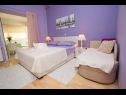 Apartmani Palmina - comfort apartment: A1 veliki (6),  A2 žuti (4+1), A3 lila (2), SA4 bijeli (2) Makarska - Rivijera Makarska   - Apartman - A3 lila (2): spavaća soba