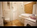 Apartmani Palmina - comfort apartment: A1 veliki (6),  A2 žuti (4+1), A3 lila (2), SA4 bijeli (2) Makarska - Rivijera Makarska   - Apartman - A3 lila (2): kupaonica s toaletom