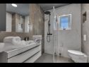 Apartmani Ivana - luxurious: A1(2+2) Makarska - Rivijera Makarska   - Apartman - A1(2+2): kupaonica s toaletom