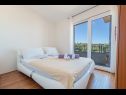 Apartmani Duki - sea view: A1(4+1), A2(3+2) Makarska - Rivijera Makarska   - Apartman - A2(3+2): spavaća soba