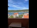 Apartmani i sobe Mila - yard: A1(4+1), R1(2+1), R2(2) Supetarska Draga - Otok Rab   - Soba - R1(2+1): pogled s balkona