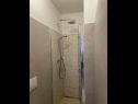 Apartmani i sobe Mila - yard: A1(4+1), R1(2+1), R2(2) Supetarska Draga - Otok Rab   - Soba - R1(2+1): kupaonica s toaletom