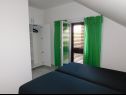 Apartmani Coloured - apartments on island: A1 - plavi (4):, A2 -zeleni (4):, SA3 - studio (2+1):, A4 - bijeli (4+2): Povlja - Otok Brač   - Apartman - A4 - bijeli (4+2):: spavaća soba