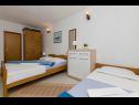 Apartmani Vlado - cosy & afordable: SA1(2), A2(3), A3(5) Supetar - Otok Brač   - Apartman - A2(3): spavaća soba
