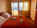 Apartmani Paradiso with gorgeous sea view: A1 Doris (4+2), SA2 Petra (2+2), SA3 Nina (2) Lokva Rogoznica - Rivijera Omiš   - Apartman - A1 Doris (4+2): spavaća soba