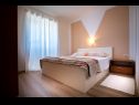 Apartmani Marija - good location A1(4+1), A2(4+1) Supetarska Draga - Otok Rab   - Apartman - A1(4+1): spavaća soba