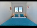 Apartmani Vera - with nice view: A2-prvi kat (6), A1-prizemlje(4), A3-potkrovlje(6) Trogir - Rivijera Trogir   - Apartman - A1-prizemlje(4): spavaća soba