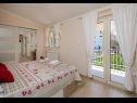 Apartmani Dora - with nice courtyard: A1(4), SA2(3) Trogir - Rivijera Trogir   - Apartman - A1(4): spavaća soba